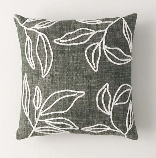 Green embroidered leaf pillow