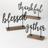 Metal Sayings Decor on Wooden Stand